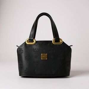 MCM Black and Gold Satchel with Structured Design